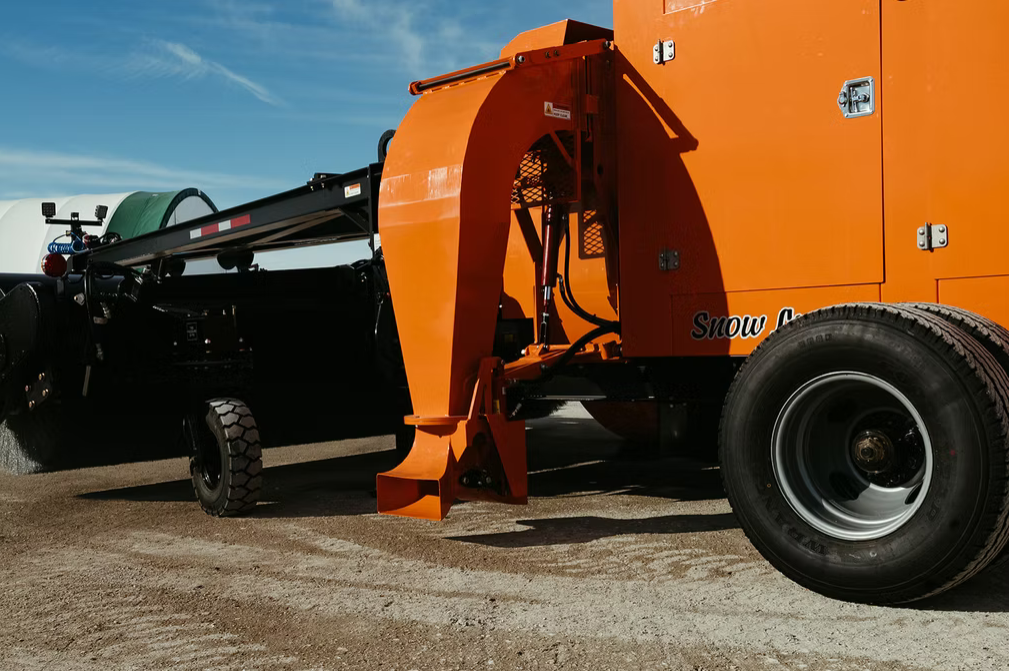 Snow Lynx RS-300 RS-300 and Snow Lynx branding on orange chassis