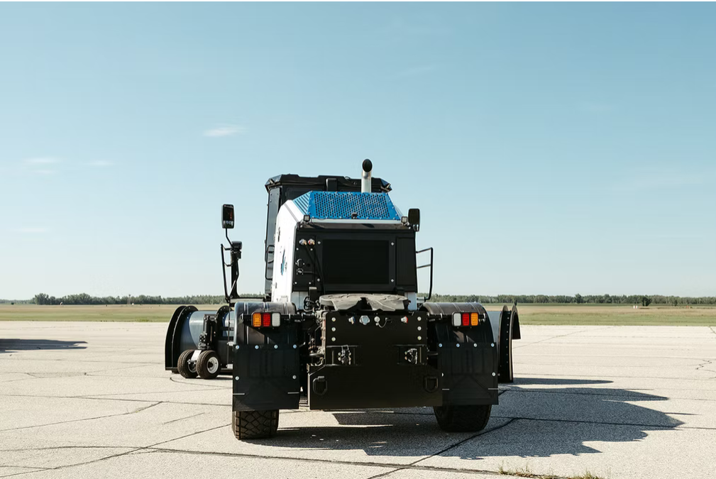 Snow Mauler PV-400 rear view on airfield tarmac