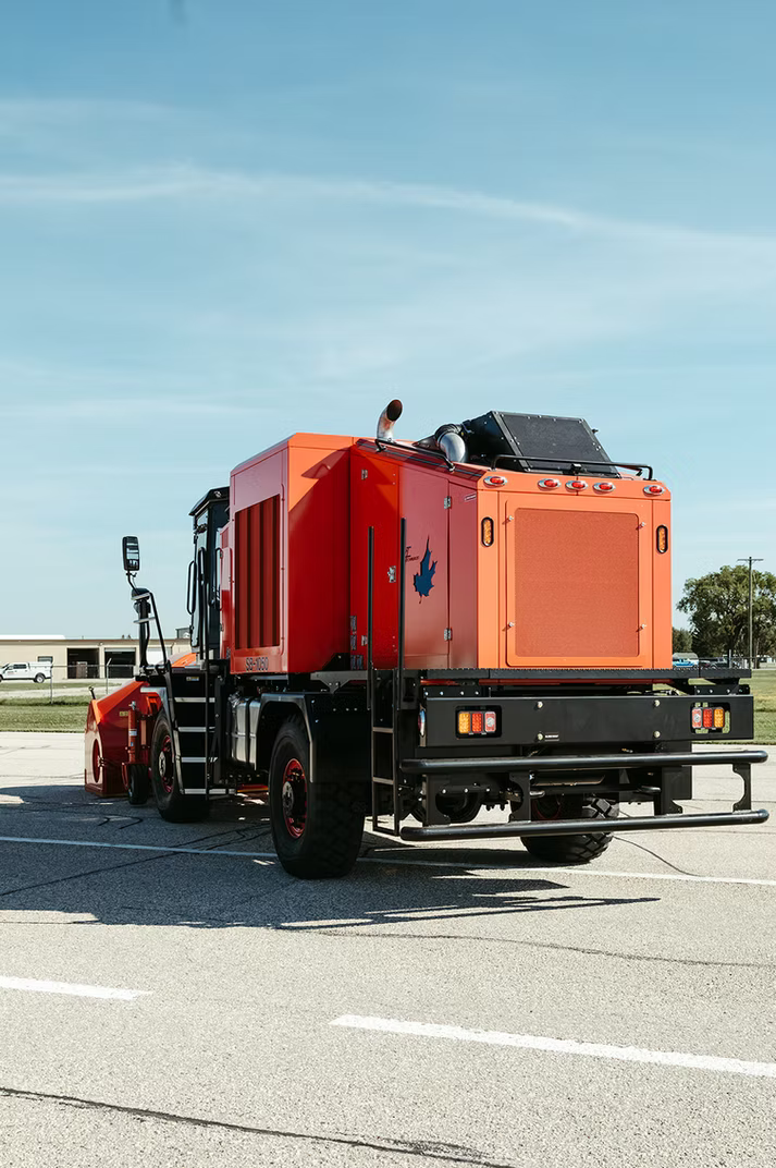 Snow Wolf SB-1050 rear 3/4 view on airfield
